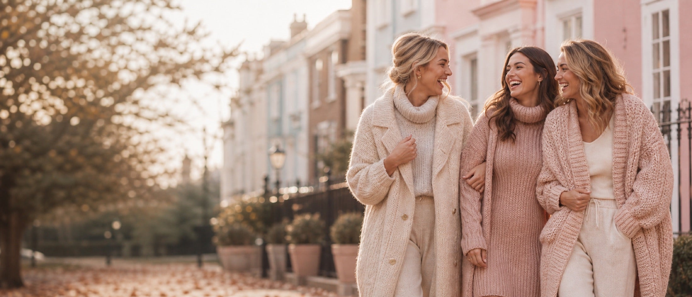 Friends wearing Graces Collection knitwear